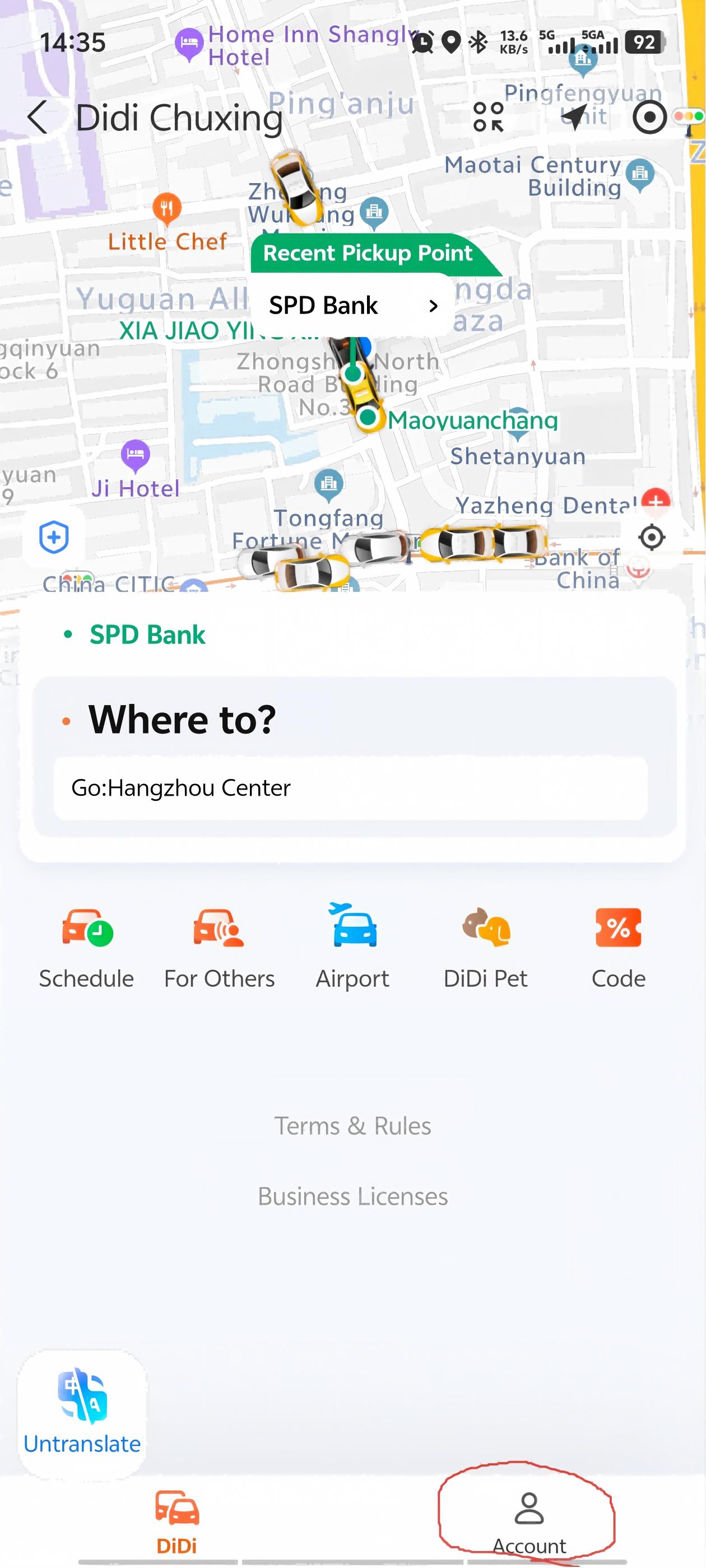 DiDi app home screen with Account button in bottom-right corner