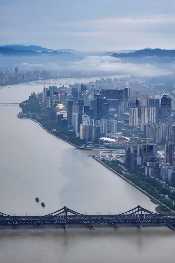 Binjiang District riverfront and skyline across the Qiantang River